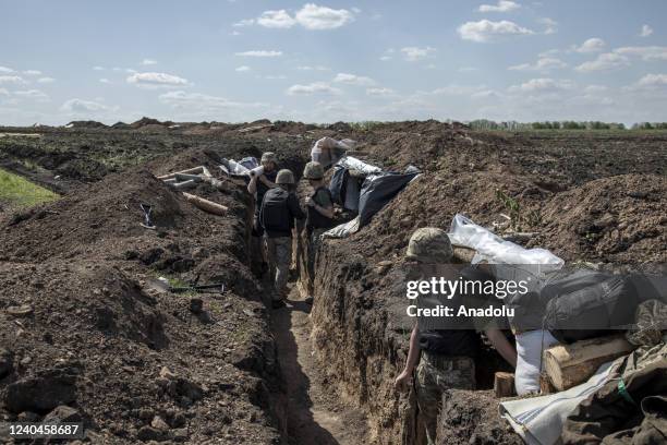 Ukrainian servicemen are seen in the trenches as fighting against Russian troops continues near to the Cherkaske City, on eastern Ukraine, May 3,...