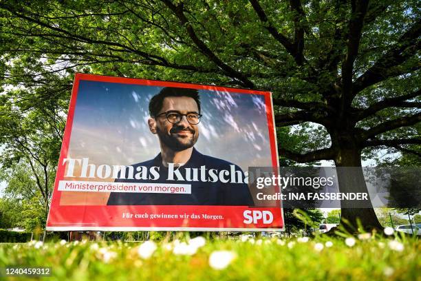 An election billboard with a poster of Thomas Kutschaty, North-Rhine Westphalia's SPD party chairman, is pictured in Krefeld, western Germany on May...