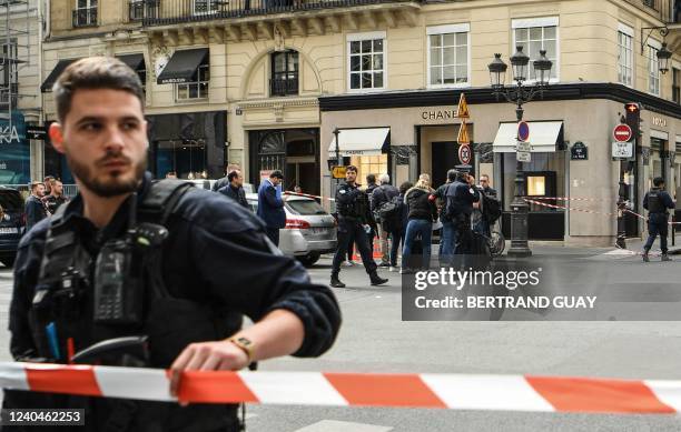 Police set up a security cordon near the entrance to a Chanel shop on Place Vendome in Paris, on May 5 after a suspected armed robbery.