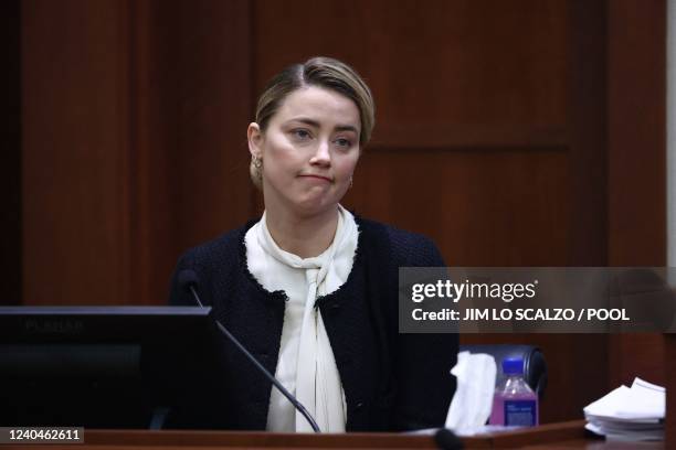 Actress Amber Heard testifies at the Fairfax County Circuit Courthouse in Fairfax, Virginia, on May 5, 2022. - Actor Johnny Depp is suing ex-wife...