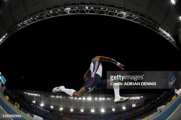 Britain's Phillips Idowu competes in the men's triple jump final at the International Association of Athletics Federations World Championships in...