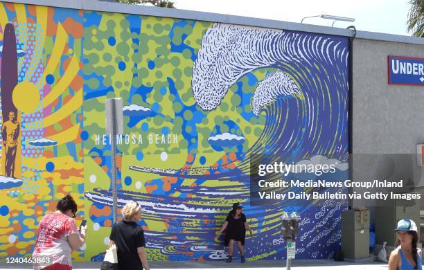 Hermosa Beach, CA The unveiling of the mural by artist John Van Hamersveld Hermosas Great Wave, on the wall of the Underground Pub & Grill, located...