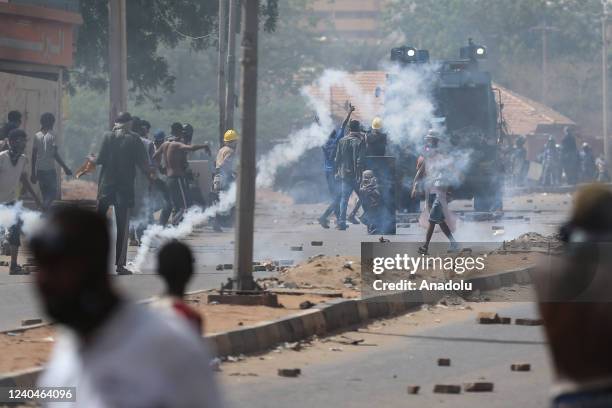 Sudanese security forces intervene with tear gas to the demonstrators after a clash break out between the demonstrators and Sudanese security forces...