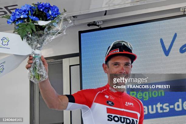 Lotto Soudal team rider Philippe Gilbert of Belgium celebrates on the podium after winning the third stage of the "4 jours de Dunkerque" cycling race...