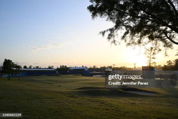 Scenic view of a sunrise behind the clubhouse,18th and ninth holes during the first round of the Zurich Classic of New Orleans at TPC Louisiana on...