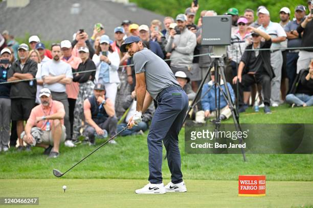 Jason Day of Australia looks over his ball on the first tee box during the first round of the Wells Fargo Championship at TPC Potomac at Avenel Farm...