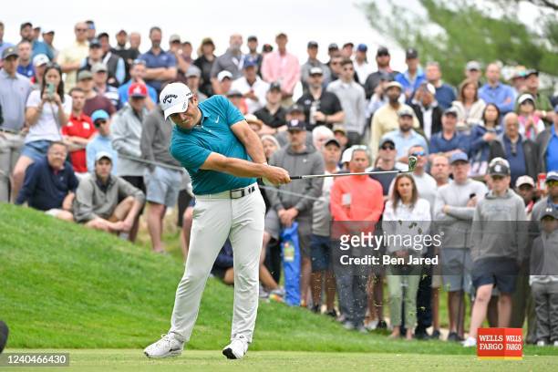 Francesco Molinari of Italy hits a shot on the ninth tee box during the first round of the Wells Fargo Championship at TPC Potomac at Avenel Farm on...