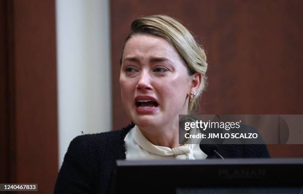 Actress Amber Heard testifies at the Fairfax County Circuit Courthouse in Fairfax, Virginia, on May 5, 2022. - Actor Johnny Depp is suing ex-wife...