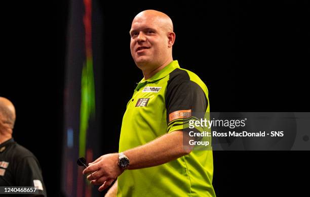 Michael Van Gerwen in action during a Cazoo Premier League Darts event at the OVO Hydro, on May 05 in Glasgow, Scotland.