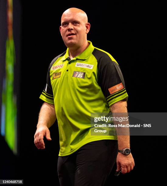 Michael Van Gerwen in action during a Cazoo Premier League Darts event at the OVO Hydro, on May 05 in Glasgow, Scotland.