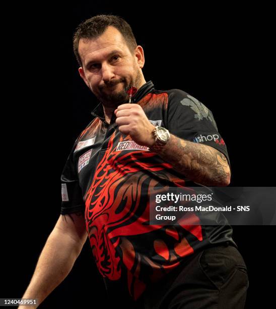 Jonny Clayton checks out against Gary Anderson during a Cazoo Premier League Darts event at the OVO Hydro, on May 05 in Glasgow, Scotland.