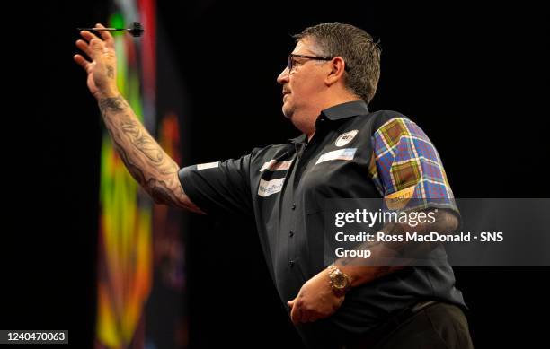 Gary Anderson in action during a Cazoo Premier League Darts event at the OVO Hydro, on May 05 in Glasgow, Scotland.