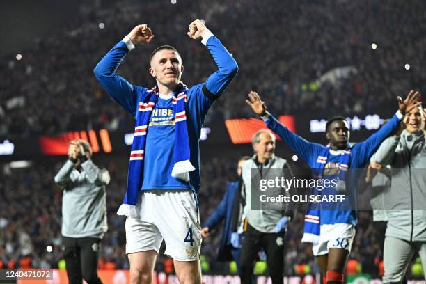 Rangers' English midfielder John Lundstram celebrates on the pitch after the UEFA Europa League Semi-final, second leg football match between Rangers...