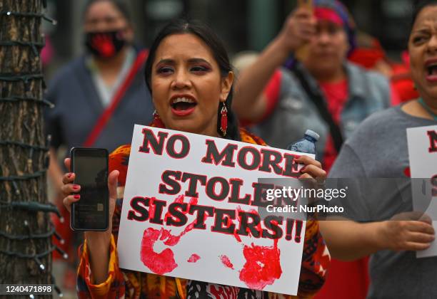 Participants during the annual Red Dress Day march in downtown Edmonton, hosted by Project REDress, commemorating the lives of missing and murdered...