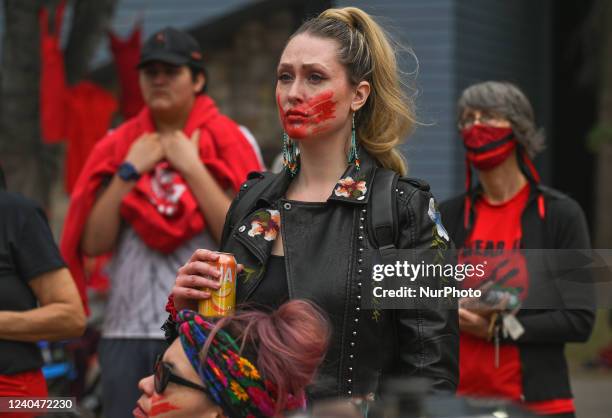 Participants during the annual Red Dress Day march in downtown Edmonton, hosted by Project REDress, commemorating the lives of missing and murdered...