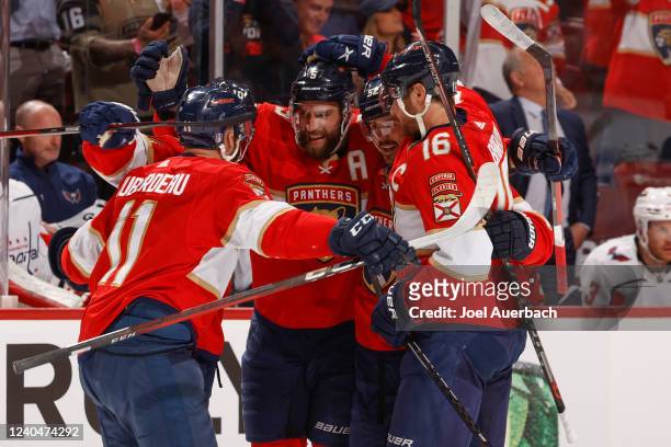 Teammates congratulate Aaron Ekblad of the Florida Panthers after he scored a first period goal against the Washington Capitals in Game Two of the...