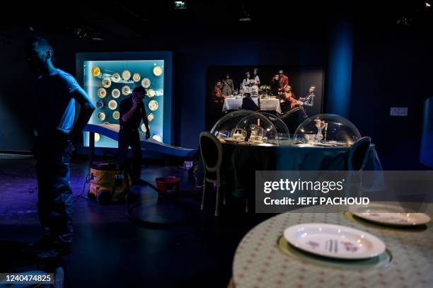 People work on the preparations of an exhibition of the new Cité Internationale de la Gastronomie et du Vin, on May 5, 2022 in Dijon, on the eve of...