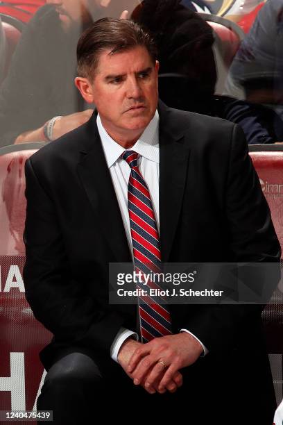 Washington Capitals Head Coach Peter Laviolette monitors game progress from the bench against the Florida Panthers in Game Two of the First Round of...