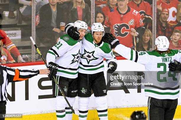 Dallas Stars Right Wing Joe Pavelski celebrates after scoring a goal with Dallas Stars Left Wing Jason Robertson and Dallas Stars Center Roope Hintz...