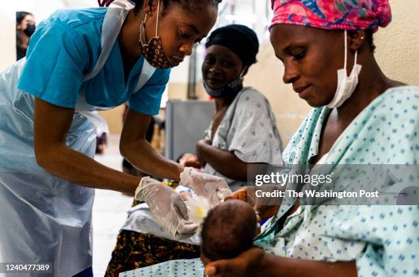 Women are taught how to breast feed their babies at Koidu Government Hospital in Kono, Sierra Leone Friday October 8, 2021. Susan Lebbies mother died...