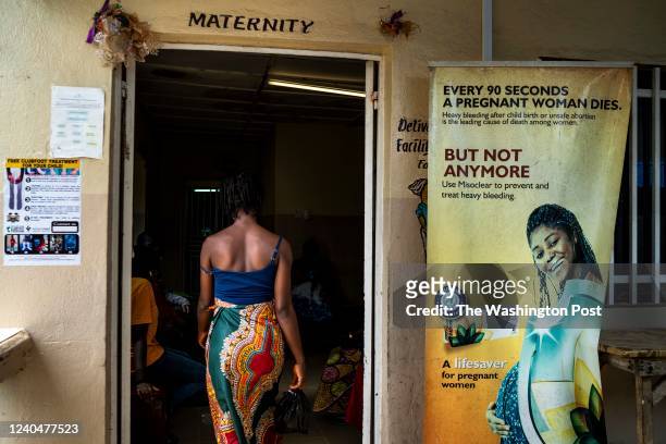 Without a home to call her own, 17-years-old and pregnant, Susan Lebbie enters the maternity building at Koidu Government Hospital for an ultrasound...