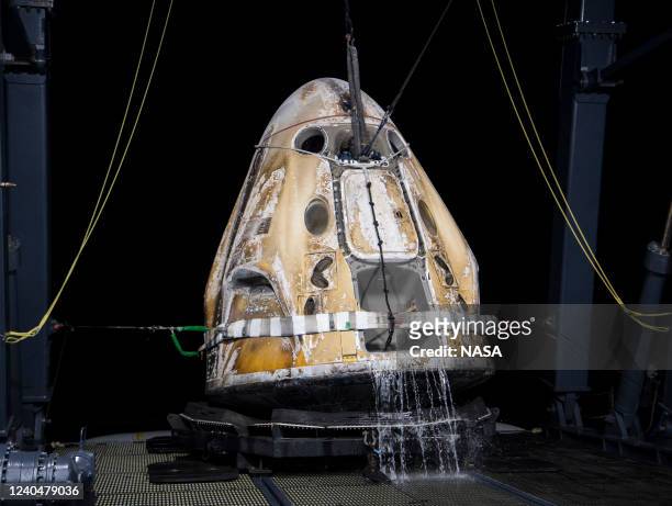 In this handout photo provided by NASA, The SpaceX Crew Dragon Endurance spacecraft is seen shortly after it landed with NASA astronauts Raja Chari,...