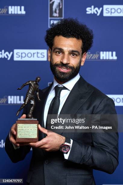 Liverpool's Mohamed Salah poses with their FWA Player of the Year Award during the FWA Footballer of the Year dinner held at the Landmark Hotel,...