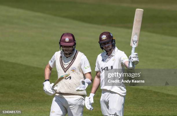 Gus Atkinson of Surrey acknowledges the applause on reaching his maiden first class half-century alongside team mate Jamie Overton during the LV=...