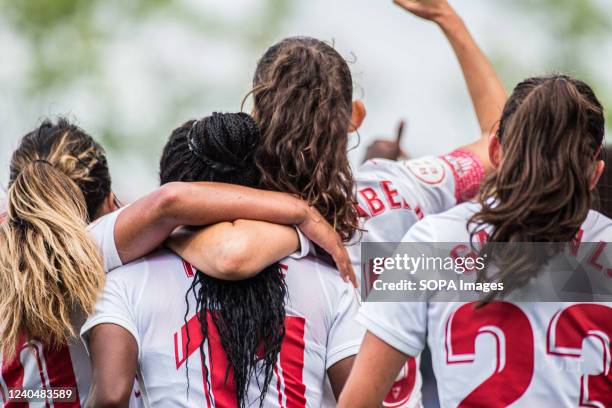 Sevilla FC players celebrate after scoring a goal during the Primera Iberdrola match between FC Barcelona Femeni and Sevilla FC Femenino at Johan...