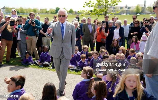 Prince Charles, Prince of Wales arrives to open the Great Field play area at Poundbury during his visit to Dorset on May 6, 2022 in Poundbury,...