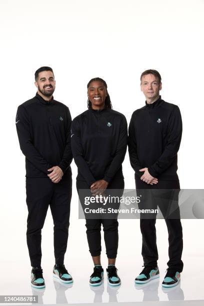 Assistant Coaches Zach O'Brien, Roneeka Hodges and Olaf Lange of the New York Liberty pose for a portrait during media day at the Barclays Center on...