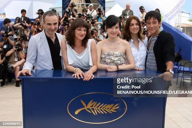Photocall 'Boarding Gate' at the 60th Cannes International Film Festival, France On May 18, 2007 - French director Olivier Assayas, Italian actress...