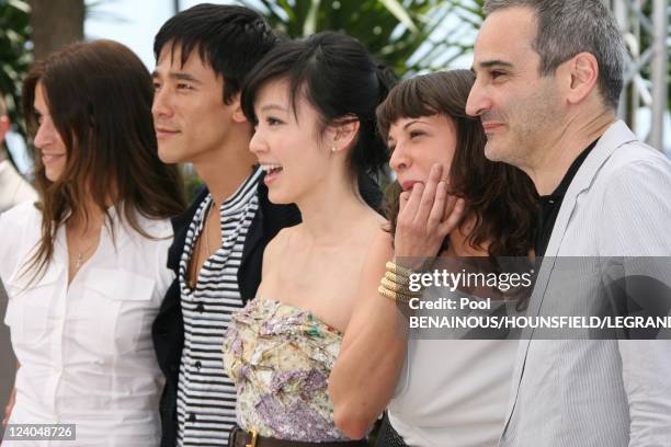 Photocall 'Boarding Gate' at the 60th Cannes International Film Festival, France On May 18, 2007 - French director Olivier Assayas, Italian actress...