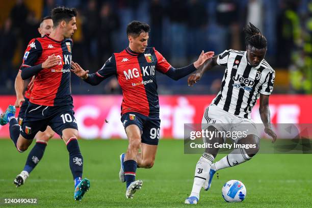 Moise Kean of Juventus runs past Silvan Hefti, Filippo Melegoni and Pablo Galdames of Genoa during the Serie A match between Genoa CFC and Juventus...