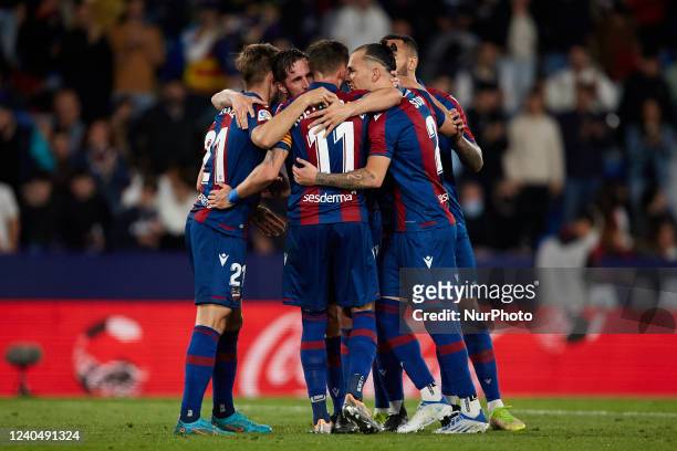 Jorge Miramon of Levante UD celebrates after scoring his side's first goal with his teammates during the La Liga Santander match between Levante UD...