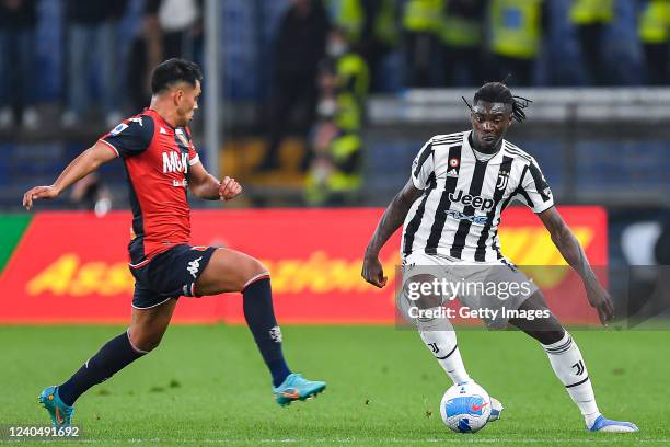 Nadiem Amiri of Genoa and Moise Kean of Juventus vie for the ball during the Serie A match between Genoa CFC and Juventus at Stadio Luigi Ferraris on...