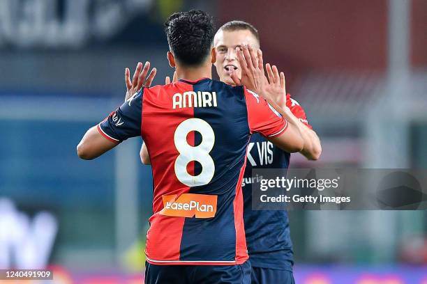 Albert Gudmundsson of Genoa celebrates with his team-mate Nadiem Amiri after scoring a goal during the Serie A match between Genoa CFC and Juventus...