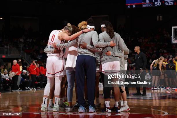 The Washington Mystics huddle up during the game against the Indiana Fever on May 6, 2022 at Entertainment & Sports Arena in Washington, DC. NOTE TO...