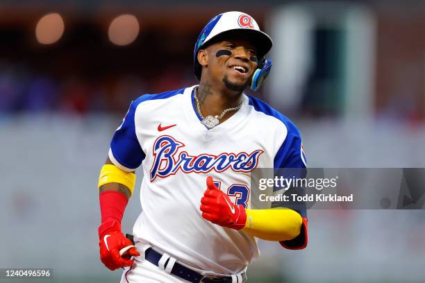 Ronald Acuna Jr. #13 of the Atlanta Braves rounds the bases after hitting a home run during the fourth inning against the Milwaukee Brewers at Truist...