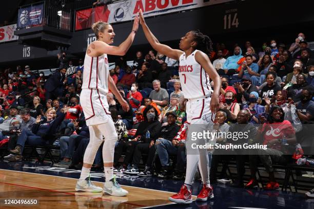 Elena Delle Donne high fives Ariel Atkins of the Washington Mystics during the game against the Indiana Feveron May 6, 2022 at Entertainment & Sports...
