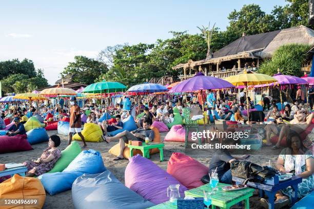 Tourists at a beach club in Seminyak, Bali, Indonesia, on Friday, May 6, 2022. With the broader reopening, fully vaccinated visitors from overseas to...