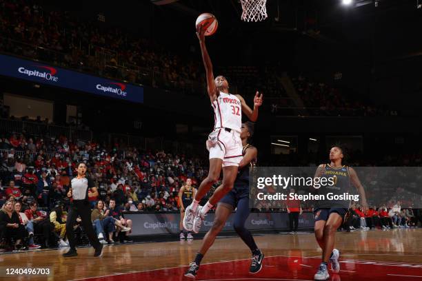 Shatori Walker-Kimbrough of the Washington Mystics dunks the ball during the game against the Indiana Fever on May 6, 2022 at Entertainment & Sports...