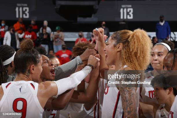 The Washington Mystics celebrate after the game against the Indiana Fever on May 6, 2022 at Entertainment & Sports Arena in Washington, DC. NOTE TO...