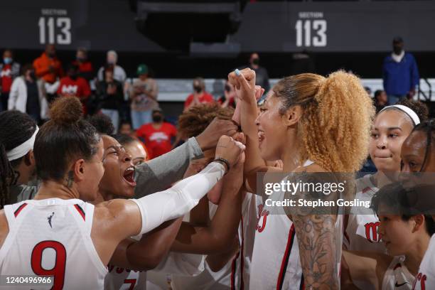 The Washington Mystics celebrate after the game against the Indiana Fever on May 6, 2022 at Entertainment & Sports Arena in Washington, DC. NOTE TO...