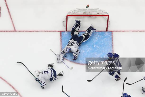 Goalie Jack Campbell of the Toronto Maple Leafs stretches to make a save against the Tampa Bay Lightning during the third period in Game Three of the...
