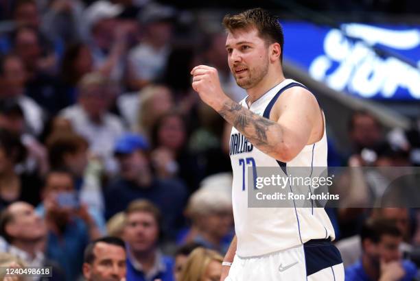 Luka Doncic of the Dallas Mavericks reacts after scoring against the Phoenix Suns during the second half of Game Three of the 2022 NBA Playoffs...