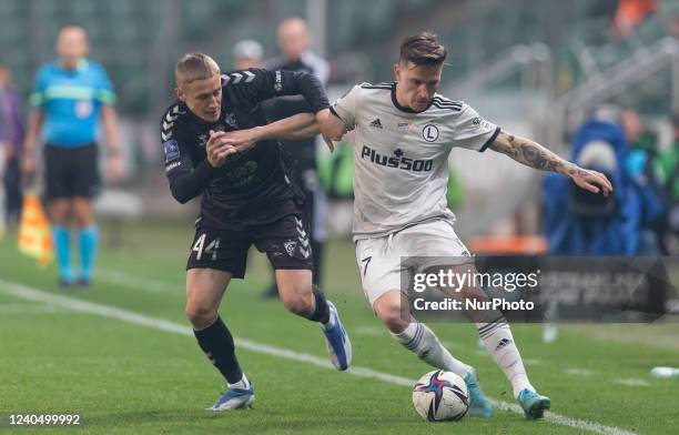 Mateusz Ziolkowski ,Benjamin Verbic during the PKO Ekstraklasa match between Legia Warsaw v Gornik Zabrze in Warsaw, Poland, on May 6, 2022.