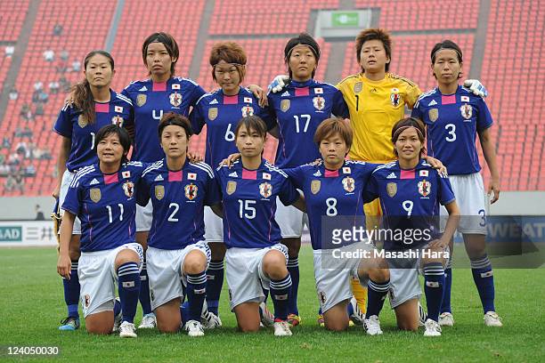 Japanese players pose for photographs prior to the London Olympic Women's Football Asian Qualifier match between North Korea and Japan at Shandong...