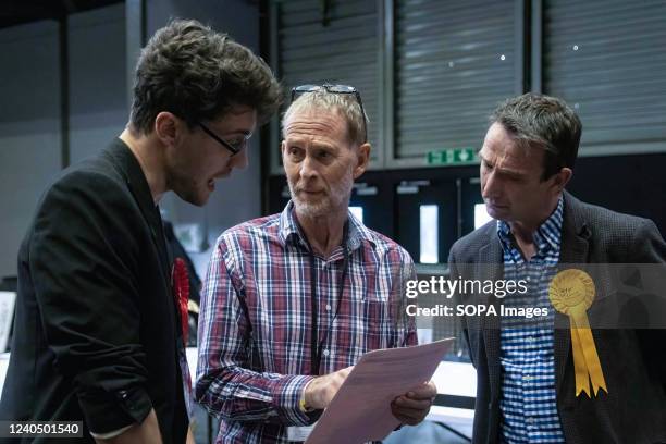 Polling officials seen counting ballots for the Didsbury West ward. After citizens cast their votes, Election officers start counting the electoral...