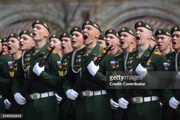 Russian officers greet a general during the Victory Day Parade main rehearsals, May 7, 2022 in Moscow, Russia. The Red Square military parade marking...